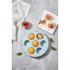 Tavă rotundă de copt brioșe IRIS din silicon pentru 7 bucăți, culoare gri, neagră sau roșie SL-3206