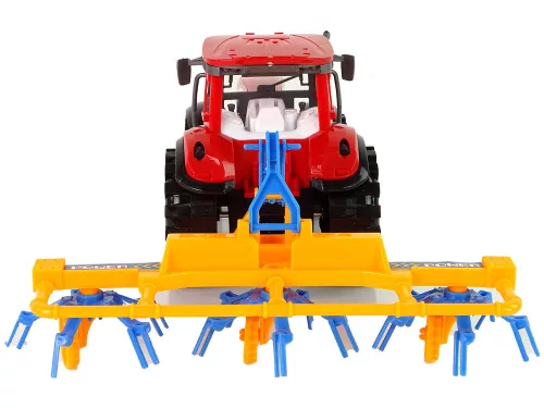 Piros traktor gereblye súrlódásos meghajtással