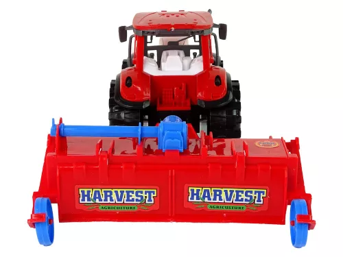 Piros traktor eke súrlódásos meghajtással