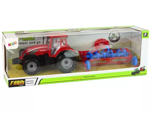 Piros traktor eke súrlódásos meghajtással