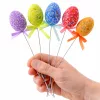 Húsvéti tojások dróton, színes mintákból készült szalagdíszítéssel, 6 db-os mintákkal