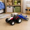 Távirányítású traktor görgővel, piros lámpákkal, 1:24